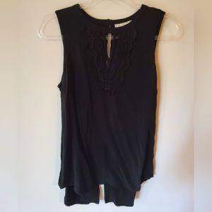 Lovely black sleeveless top with gorgeous lace accents